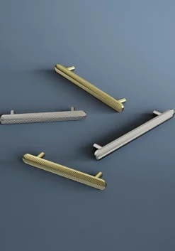 Poignée de meuble arrondi GoodHome Garlan aluminium effet laiton satin doré l.136mm x l.15mm x H. 27mm entraxe 96mm