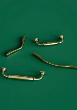 Poignée de meuble nœud GoodHome Ruis effet laiton doré l.148mm x l.20mm x H. 38mm entraxe 128mm
